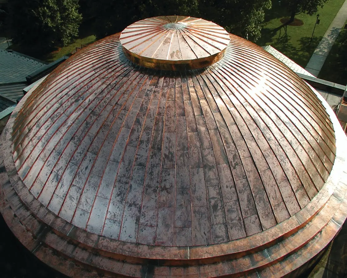 Craftsman Roofing crew installing a new roof in Jamesville